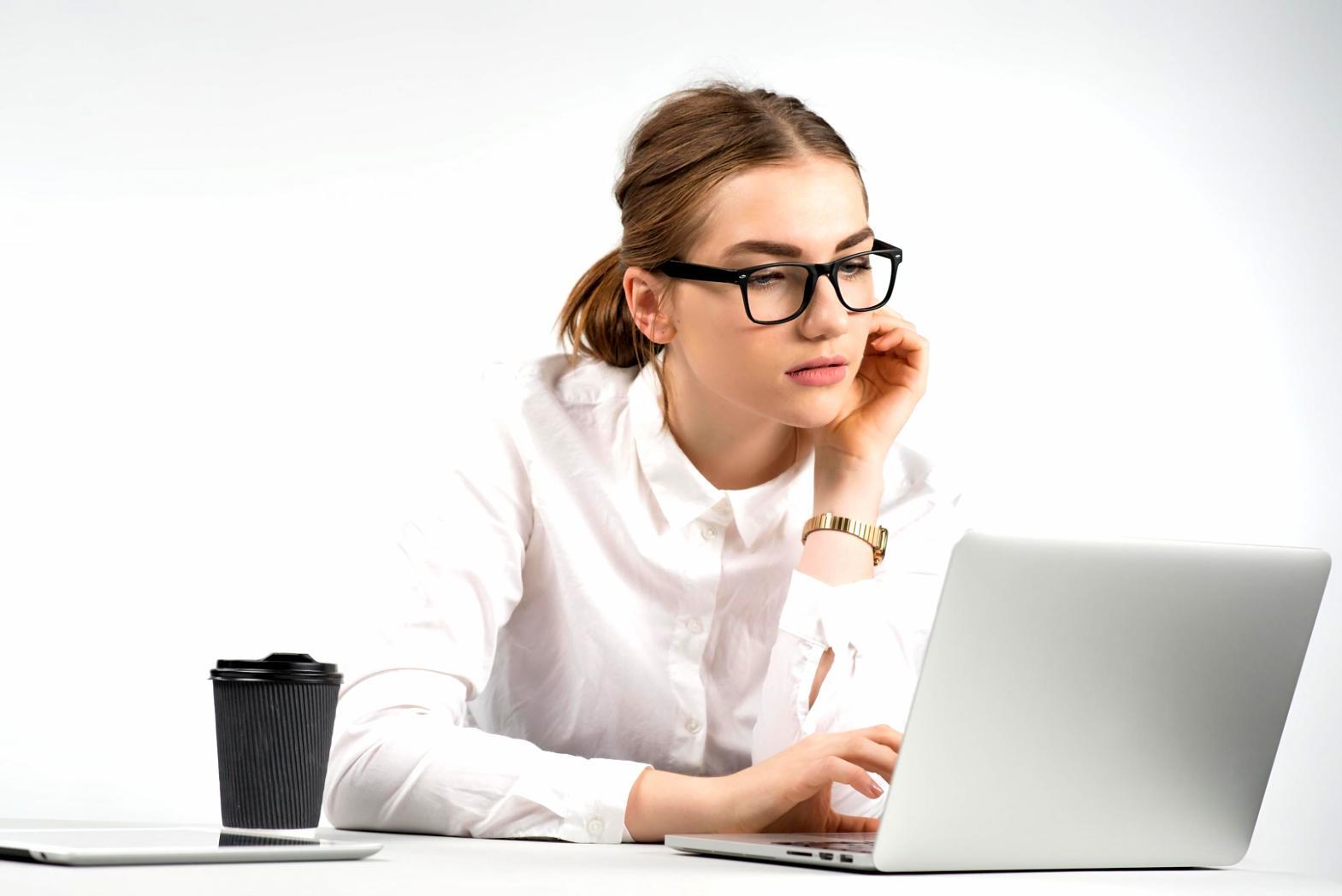 Professional workspace with financial analysis tools and budget planning materials